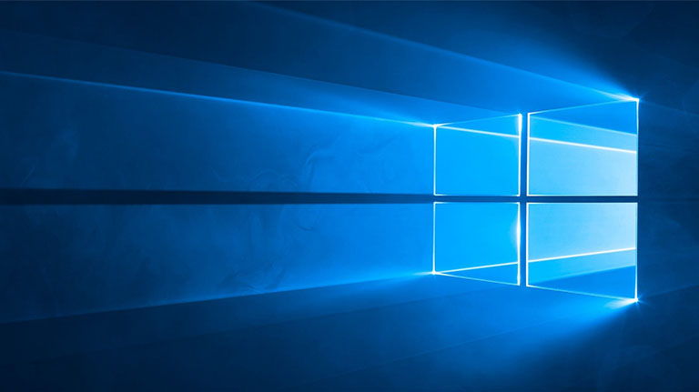 Windows 10 graphic: light streaming through a window.