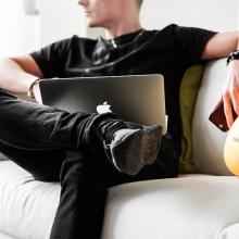 Man on lounge with laptop